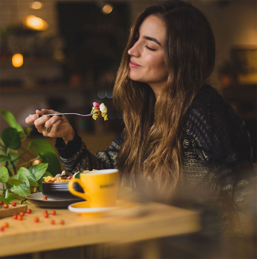 A guest enjoying a meal at Felt & Fern